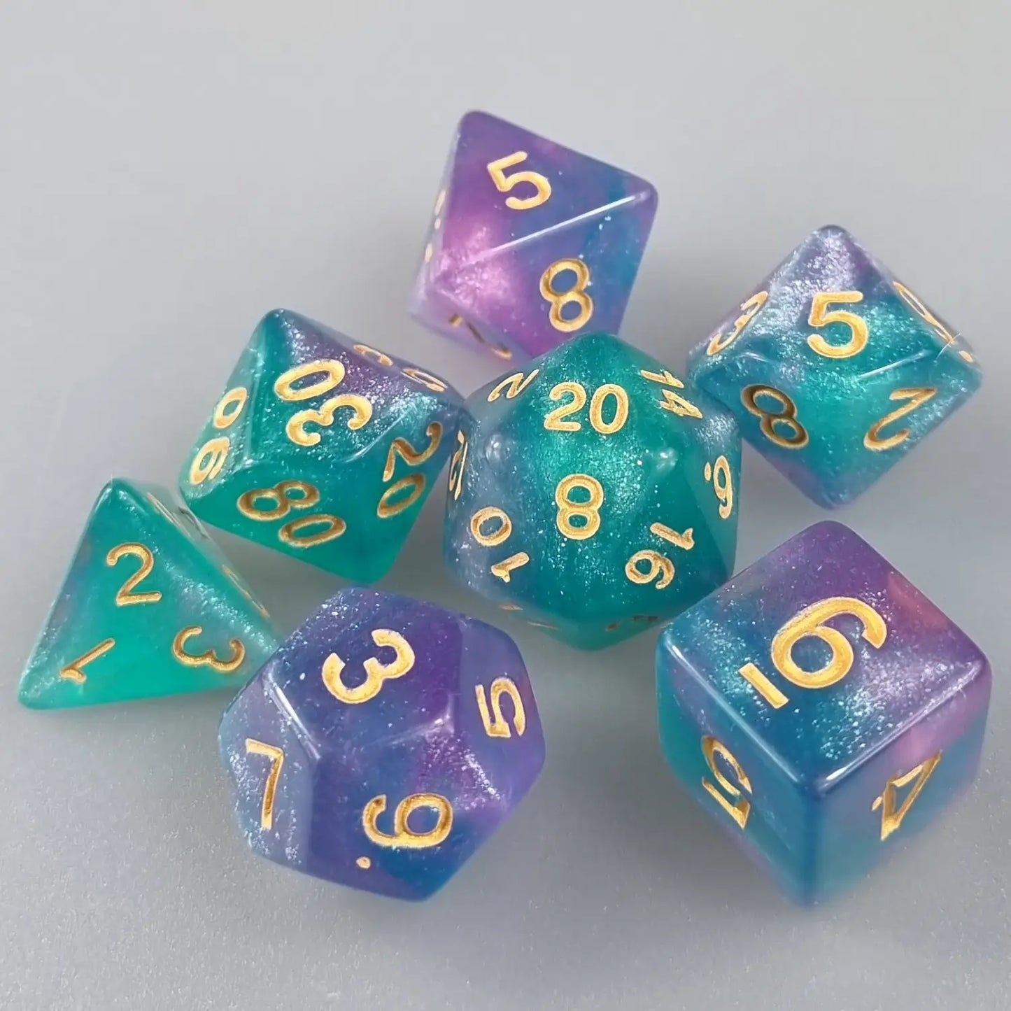 Turquoise & Purple Cosmos Dungeons & Dragons Dice Set  DiceBag.co.uk